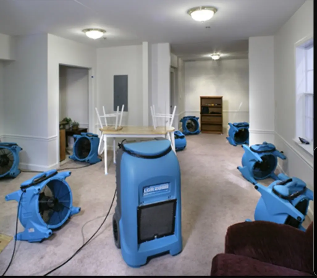Air movers and dehumidifier setup for Water Damage Restoration in Stratford